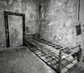 Grayscale shot of an old prison cell at Eastern State Penitentiary in Philadelphia, Pennsylvania Royalty Free Stock Photo