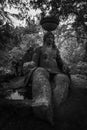 Grayscale shot of the sculpture of the giant Persephone at the famous monster park in Italy