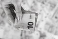 Grayscale shot of ten euros banknote in a woman's hand Royalty Free Stock Photo