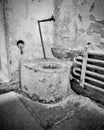 Grayscale shot of a toilet tat the Eastern State Penitentiary in Philadelphia, Pennsylvania Royalty Free Stock Photo