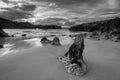Grayscale shot of Toro beach. Llanes. Asturias. Spain.