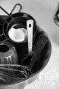 Grayscale shot of various kitchen utensils and spatulas in an array. Royalty Free Stock Photo