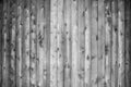 Grayscale shot of a wall made of vertical wooden planks - perfect for a cool wallpaper background Royalty Free Stock Photo
