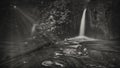 Grayscale shot of a waterfall - perfect for background Royalty Free Stock Photo