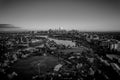 Grayscale view of Lake Albert Park and the skyline of Melbourne, Australia