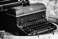 Grayscale view of a vintage typewriter with Latin alphabet