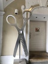 Giant silver scissor artwork in the city centre of Graz, Austria.