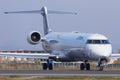 Lufthansa Regional jet lining up runway for departure