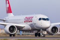 Swiss Airbus A220 lining up runway for departure to Zurich Royalty Free Stock Photo