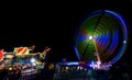 Graz, Austria - October 05, 2019: Ferris wheel in motion in the amusement park, at night. Long exposure photography Royalty Free Stock Photo