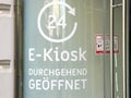 Graz, Austria - September 06, 2025: E-Kiosk storefront with 24-hour service sign, showcasing modern design and accessibility for Royalty Free Stock Photo