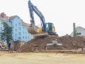 Graz, Austria-17.08.2020:Yellow industrial excavator working on demolition/construction site