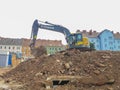 Graz, Austria-17.08.2020: Yellow industrial excavator working on demolition/construction site