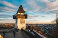 Graz city landmark Schlossberg park tower at sunset and city pan Royalty Free Stock Photo