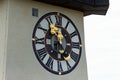 Graz, Steiermark/Austria - September 27 2019: Closeup detail shot of the Uhrturm clock-face with the golden layered dials Royalty Free Stock Photo