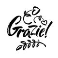 Grazie - thank you in Italian. Calligraphy inscription, black word on white background. Handwritten note