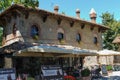 People in small tourist restaurant in medieval castle. Grazzano