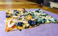 Greasy fat huge olive pizza in Playa del Carmen Mexico