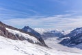 Great Aletsch glacier and Bernese Alps and jungfrau snow mountain peak  with blue sky background view from Jungfraujoch top of Royalty Free Stock Photo