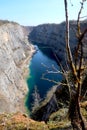 Great America Velka Amerika - Czech Grand Canyon. The partly flooded, abandoned limestone quarry near Morina village. Royalty Free Stock Photo