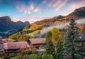 Great autumn sunrise in Selva di Cadore village.