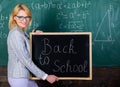 Great beginning of school year. Top ways to welcome students back to school. Teacher woman hold blackboard inscription