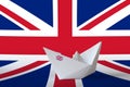 Great britain flag depicted on paper origami ship closeup. Handmade arts concept Royalty Free Stock Photo