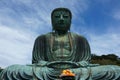 Great Buddha of Kamakura, a monumental outdoor bronze statue of Amitabha. Sitting Buddha at sky