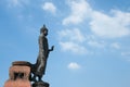 The great Buddha statue in standing pose, viewed from the side with sky background Royalty Free Stock Photo