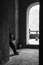 Old man being the guard of the Buddha temple on top of the hill