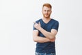 Great choice for cool guys like me. Portrait of confident charming redhead caucasian guy with bristle in casual outfit