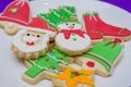 Great christmas background, christmas biscuits on white plate with blue background