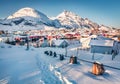 Great Christmas day on Lofoten Islands. Bright snowy cityscape of Sorvagen town, Norway, Europe.