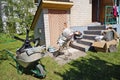 Old rubbish metal and plastic  are taken out on a wheelbarrows Royalty Free Stock Photo