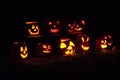 Spooky collection of Jock O` Lanterns on a crisp fall evening