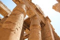 The great columns with carved hieroglyphs at the Karnak temple,  Thebes of Egypt in Luxor Royalty Free Stock Photo