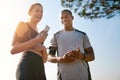 Great company for an outdoor run. a fit young couple working out together outdoors. Royalty Free Stock Photo