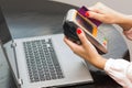 Great concept of online payment, purchase over the internet, woman buying over the internet using a laptop, credit card in hand Royalty Free Stock Photo