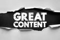 GREAT CONTENT text revealed under torn paper with textured grunge effect. Bold typography emphasizes powerful messaging, Royalty Free Stock Photo