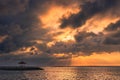 Great contrasting sunrise with lots of clouds. Sanur, Bali, Indonesia