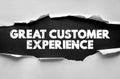 GREAT CUSTOMER EXPERIENCE bold text on torn paper background. Concept for business service, user satisfaction, client support, Royalty Free Stock Photo