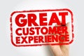 GREAT CUSTOMER EXPERIENCE stamp shown in bold text within a rough rectangular frame with a hand holding a marker, focusing on Royalty Free Stock Photo