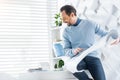 Delighted architect constructing a model of the house Royalty Free Stock Photo