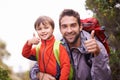 Great day for a hike. Portrait of a father and son enjoying a hike together. Royalty Free Stock Photo