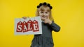 Great discounts for preschool kids. Child girl showing Sale word inscription banner. Black Friday