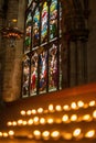 Great East Window in St Giles Cathedral and burning candles, Edinburgh old town, Scotland, UK