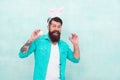 Great Easter Gift. springtime with easter eggs. Easter Holiday Greeting. happy bearded man with egg in hand. celebrating