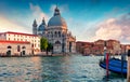 Great evening view of Grand Canal and Santa Maria della Salute Church. Colorful spring sunset in Venice, Italy, Europe. Splendid Royalty Free Stock Photo