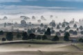 Great foggy pasture landscape in the early morning in Matamata, the true Hobbiton landscape, New Zealand