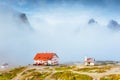 Great foggy view of the National park Tre Cime di Lavaredo. Location Dolomiti alps, Italy